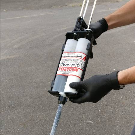 Image showing the epoxy glue gun with megapoxy 36 gun grade epoxy being used